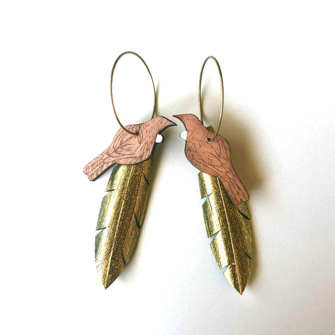 Tui on Gold feather earrings