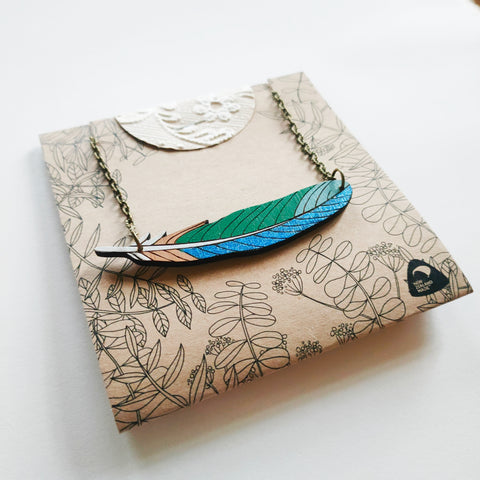 Tui feather necklace